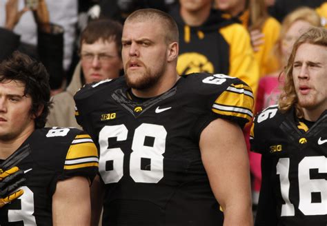 No player in college football history has more tackles for loss (78) than DeVries. . University of iowa football players